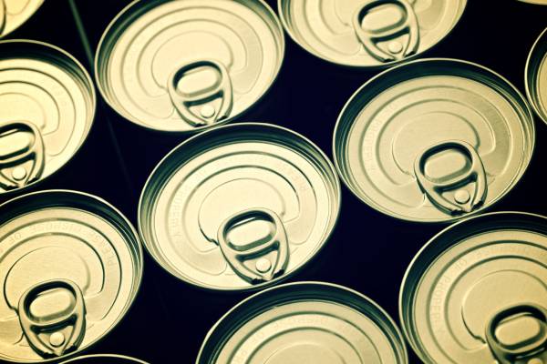 Depalletising system for composite cans in the Food sector